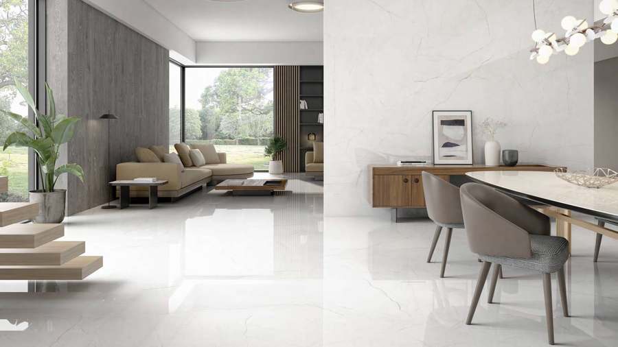 Salón comedor con suelo de porcelánico blanco pulido en piezas cuadradas de gran formato